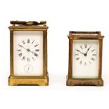 A gilt brass cased carriage clock, the white enamel dial marked 'Exam'd by Dent',