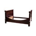 An Empire mahogany bed,