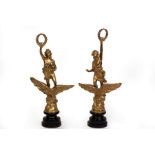 A pair of gilt metal Classical figures,