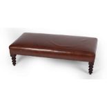 A George Smith footstool, on turned legs,