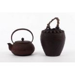 A Japanese cast iron Ikebana,