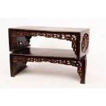 A pair of Chinese low tables, Qing dynasty, with carved ends,