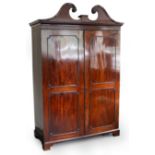 A George III mahogany cupboard,