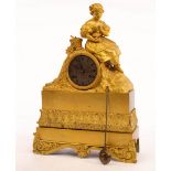 A French gilt metal mounted mantel clock, the surmount modelled as a girl holding a nest, 38.