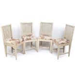 A set of four Swedish painted dining chairs,