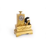 A French gilt metal eight-day mantel clock, the case with urn surmount,