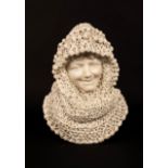 A Victorian marble bust of a girl with lace shawl covering her head,