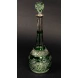 A green flash cut glass decanter with a German .