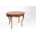 An Edwardian walnut centre table, cross banded and fitted a drawer to the frieze,