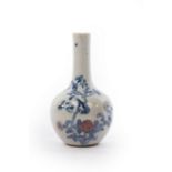 A Chinese vase decorated a bird on chrysanthemums in underglaze red and blue,