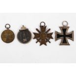 WWII German Medals comprising; Iron Cross, 2nd Class, suspension ring stamped '128' for the maker S.