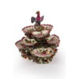 A late 18th Century polychrome sweetmeat stand of seven shell-shaped tiers,