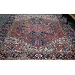 A Heriz carpet, North West Persia, second quarter 20th Century, minor re-piling and wear,