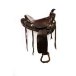A leather Western saddle, H H Hester, Denver, Colorado, decorated throughout,