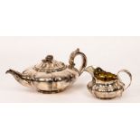 A George IV silver teapot and cream jug, Charles Thomas Fox, London 1828, of melon shape,