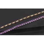 A diamond and sapphire bracelet set in 9ct gold, 18cm long and a gem set line bracelet in silver,