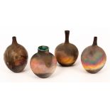Simon Rich (born 1949), four small vases, raku fired iridescent glaze,