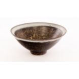 Emmanuel Cooper (1938-2018), a stoneware bowl, white opaque glaze over black slip,
