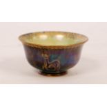 A Wedgwood Fairyland lustre bowl, the exterior with gilt animal designs on mottled brown ground,