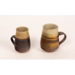 Mary Rich (born 1940), two stoneware coffee mugs, impressed mark,