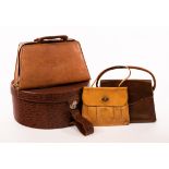 Theo Merrett, a group of hand tooled leather bags, including hat box,
