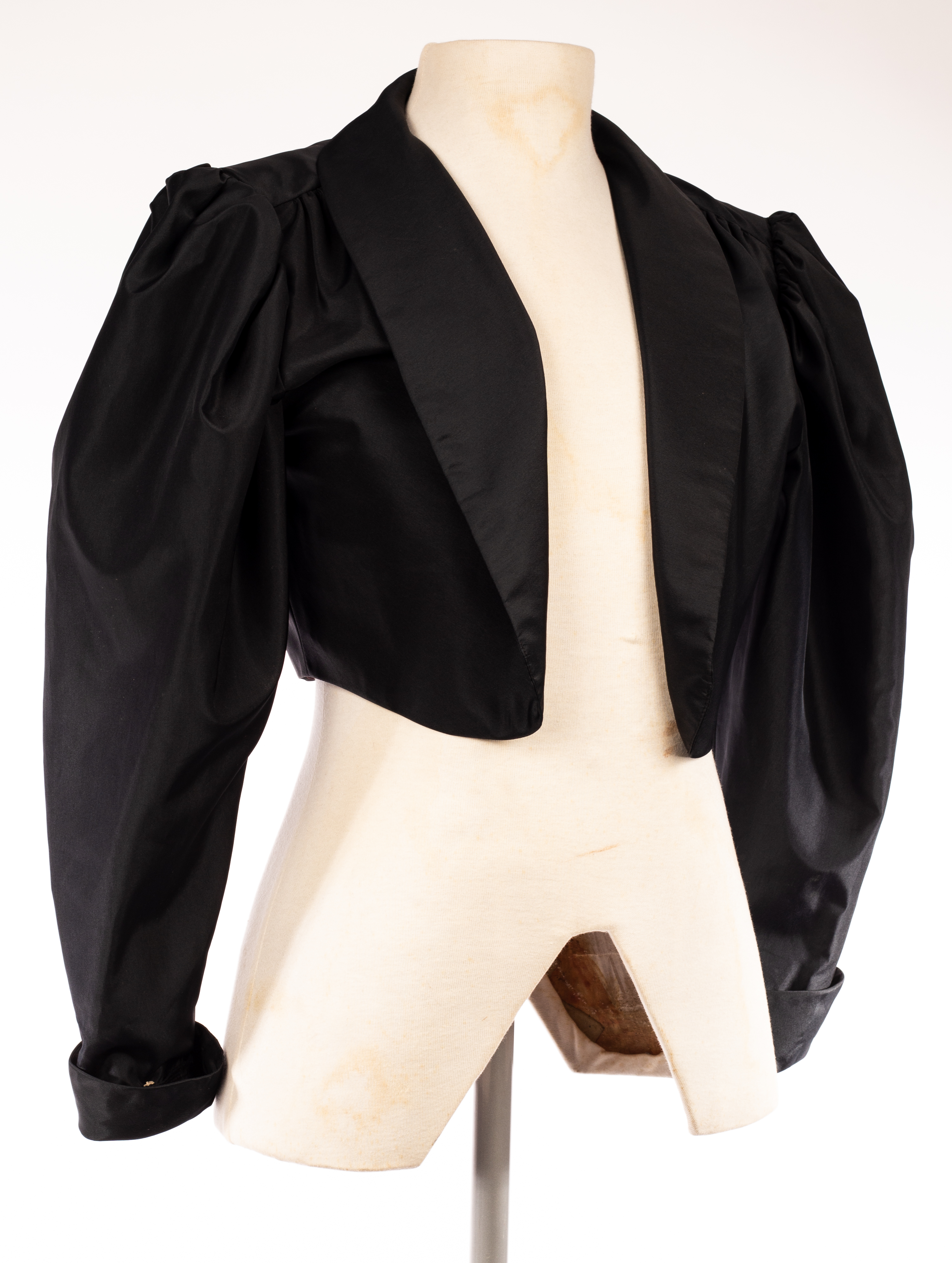 Frank Usher, a short black evening jacket,