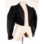 Frank Usher, a short black evening jacket,