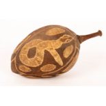 Aboriginal 20th Century, a boab nut carved in the traditional style with turtle, lizard and snake,