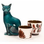 Poole Pottery, a model of a seated cat, teal glaze, marked to base Poole England,