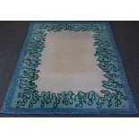 A French modern wool rug of cream ground with a blue border, initialled BG,