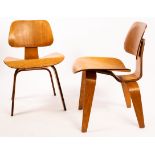 Charles and Ray Eames, two DCW plywood chairs, manufactured by Herman Miller,