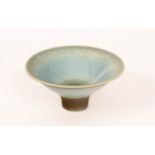 David White (1934-2011), a porcelain footed bowl, pale blue crackle glaze, impressed mark,