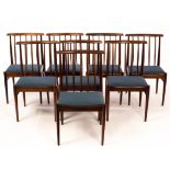 Style of Arne Vodder, a set of eight rosewood dining chairs, mid Century, with curved toprail,