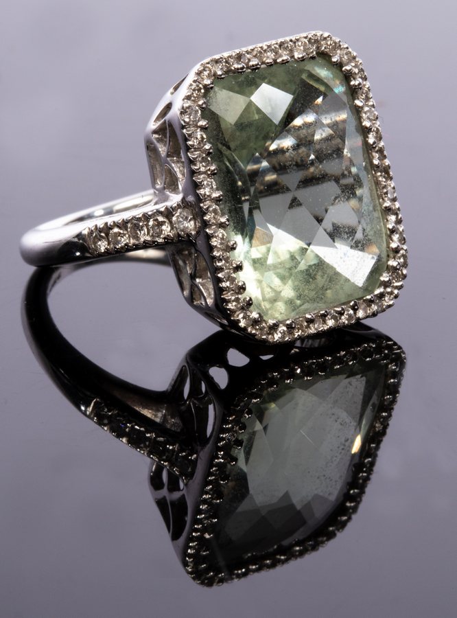 Kiki McDonough, a green amethyst and diamond cluster ring,