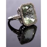 Kiki McDonough, a green amethyst and diamond cluster ring,