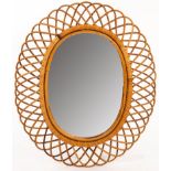 Style of Franco Albini, a canework oval mirror,