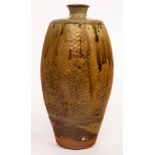 Phil Rogers (1951-2020), a stoneware bottle vase, the facetted sides with latticework, ash glaze,