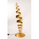 Tom Dixon (born 1959), a kinetic spiral floor lamp, steel with applied gold leaf, on a domed base,