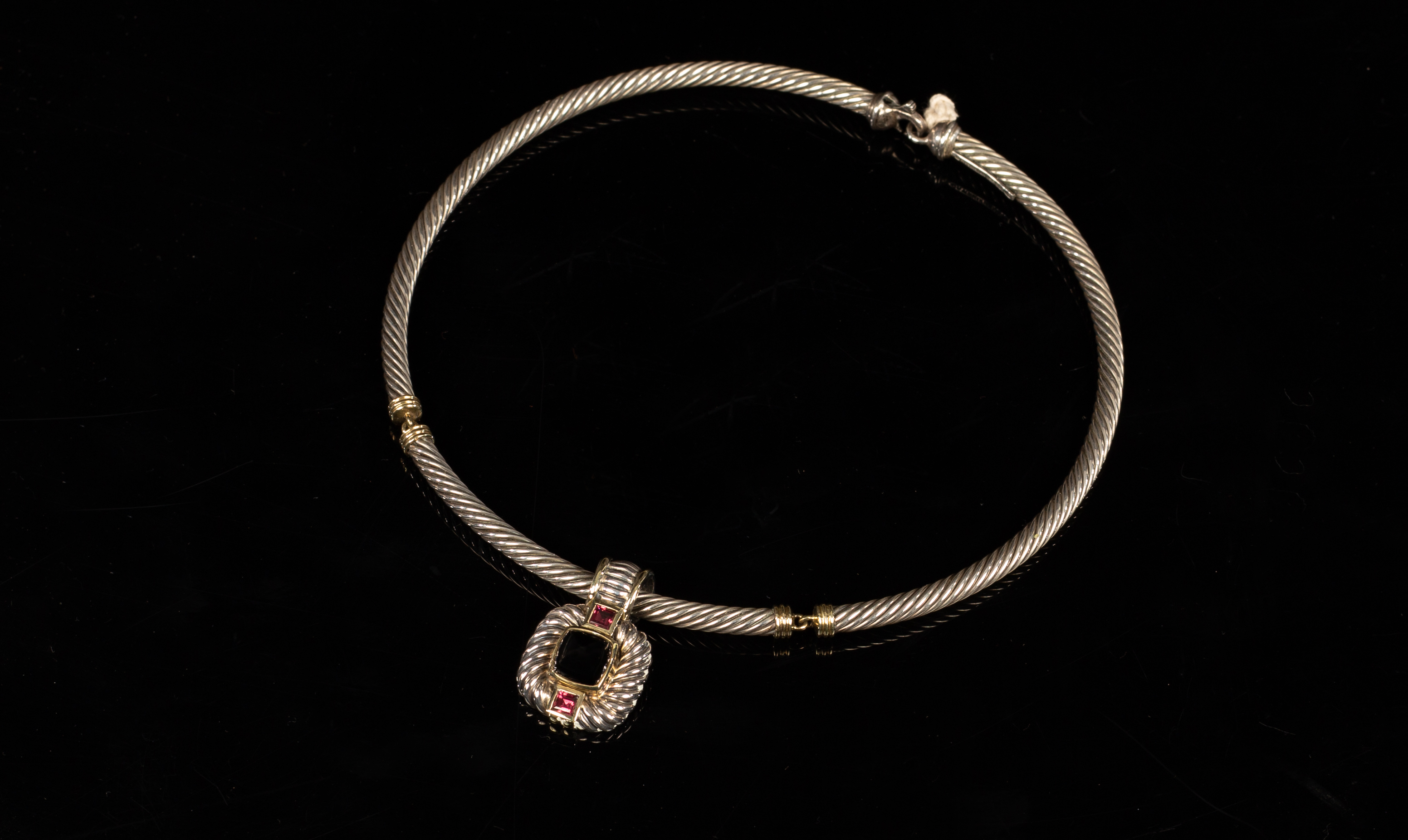 David Yurman, a silver pendant necklace, the necklace of cable form with 14k yellow gold collars,