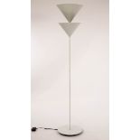 A 20th Century white floor lamp with twin cone shaped shades,