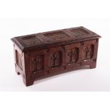 An Arts & Crafts oak table casket, carved panels of foliage and quatrefoil motifs,