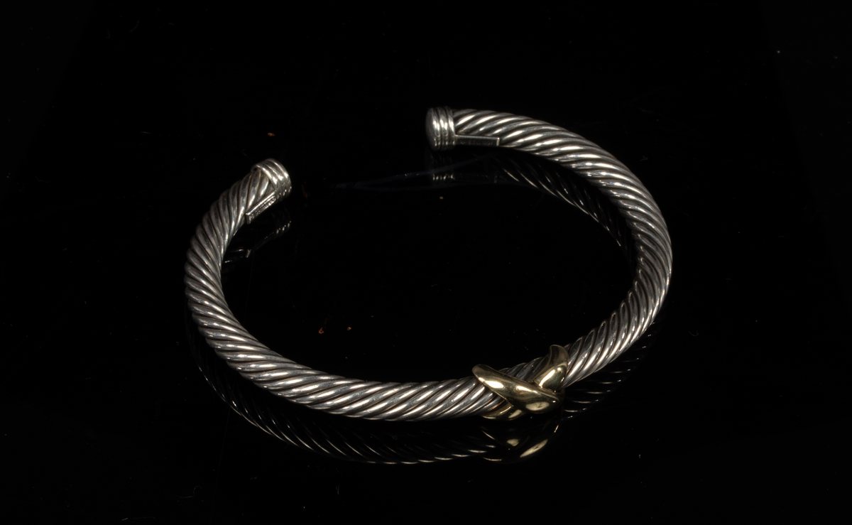 David Yurman, a silver and gold cable bangle, with central 14ct yellow gold cross, signed, - Image 3 of 3