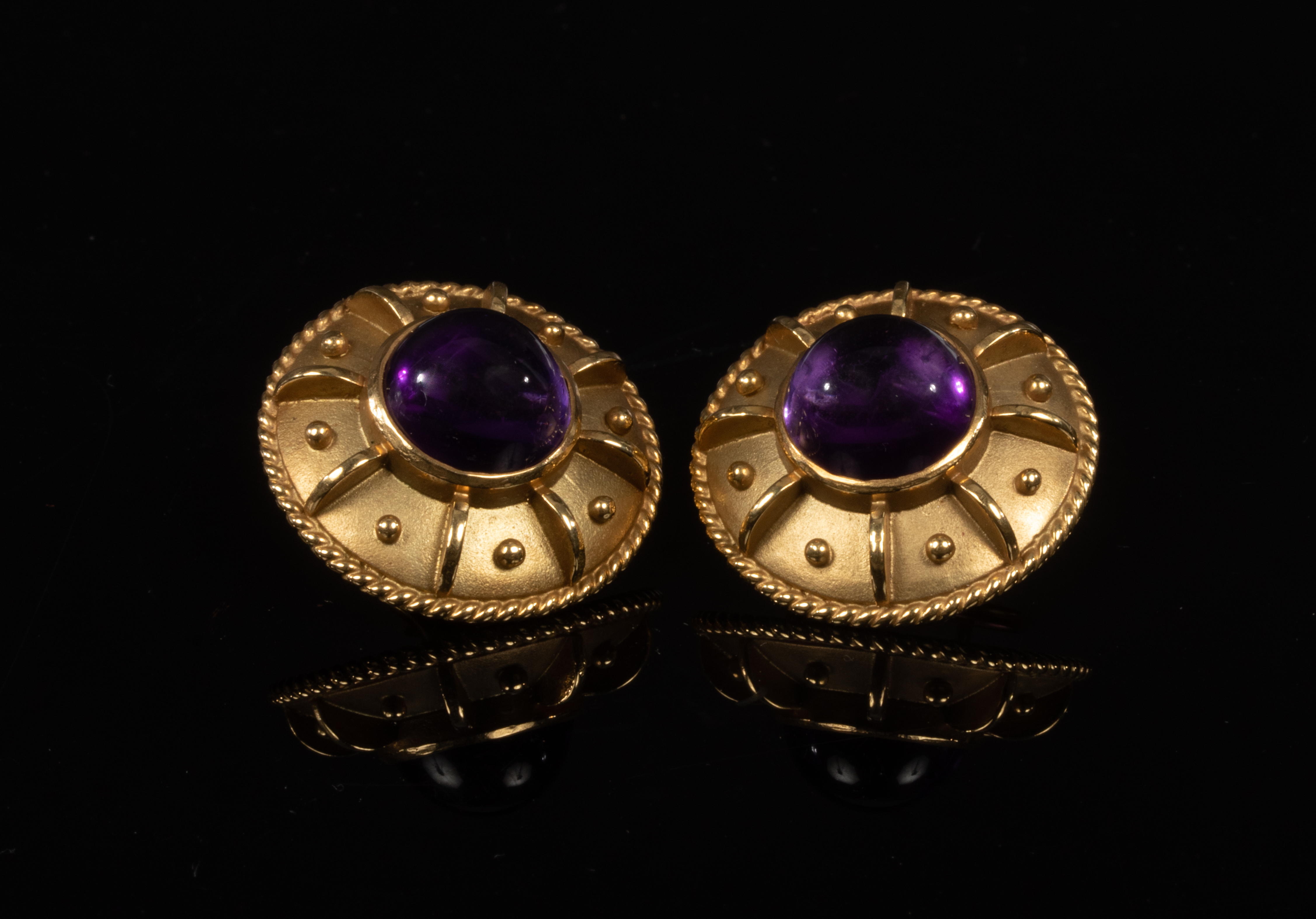 Kiki McDonough, a pair of amethyst and 18ct gold shield shaped earrings,