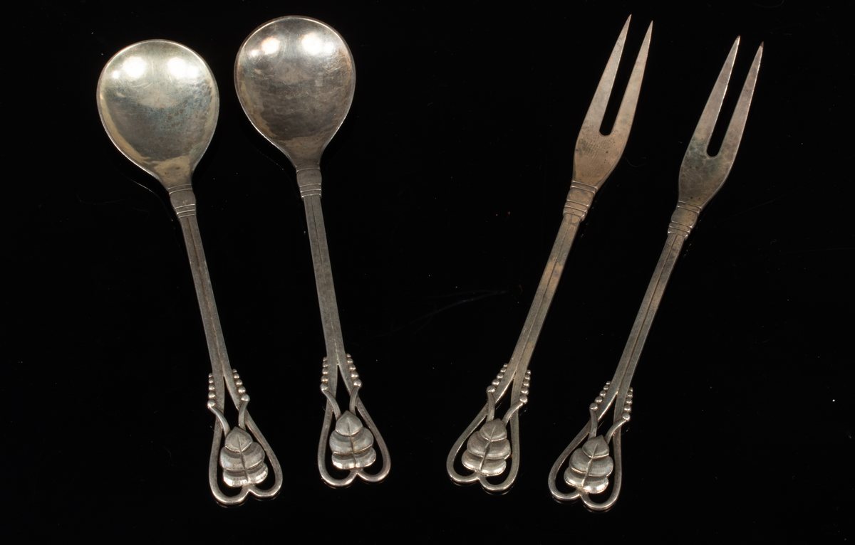 Georg Jensen: A pair of silver spoons and a pair of pickle forks, - Image 2 of 2