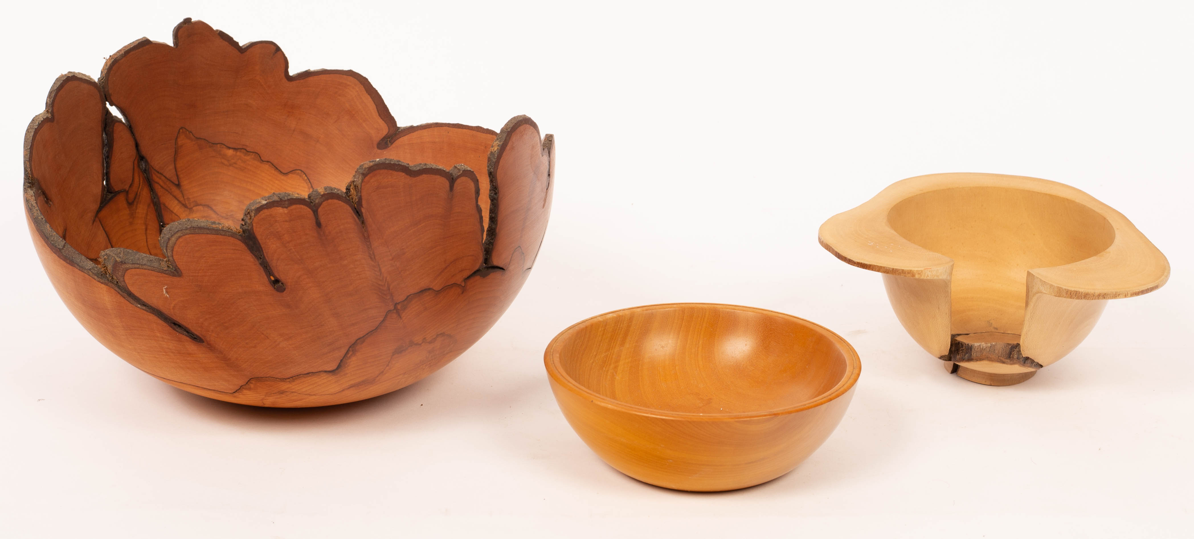 Dave Regester, a turned quince wood bowl with natural form edge,