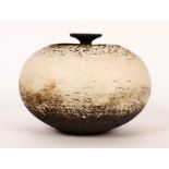Waistel Cooper (1921-2003)/A stoneware vessel of globular form, dry white glaze,