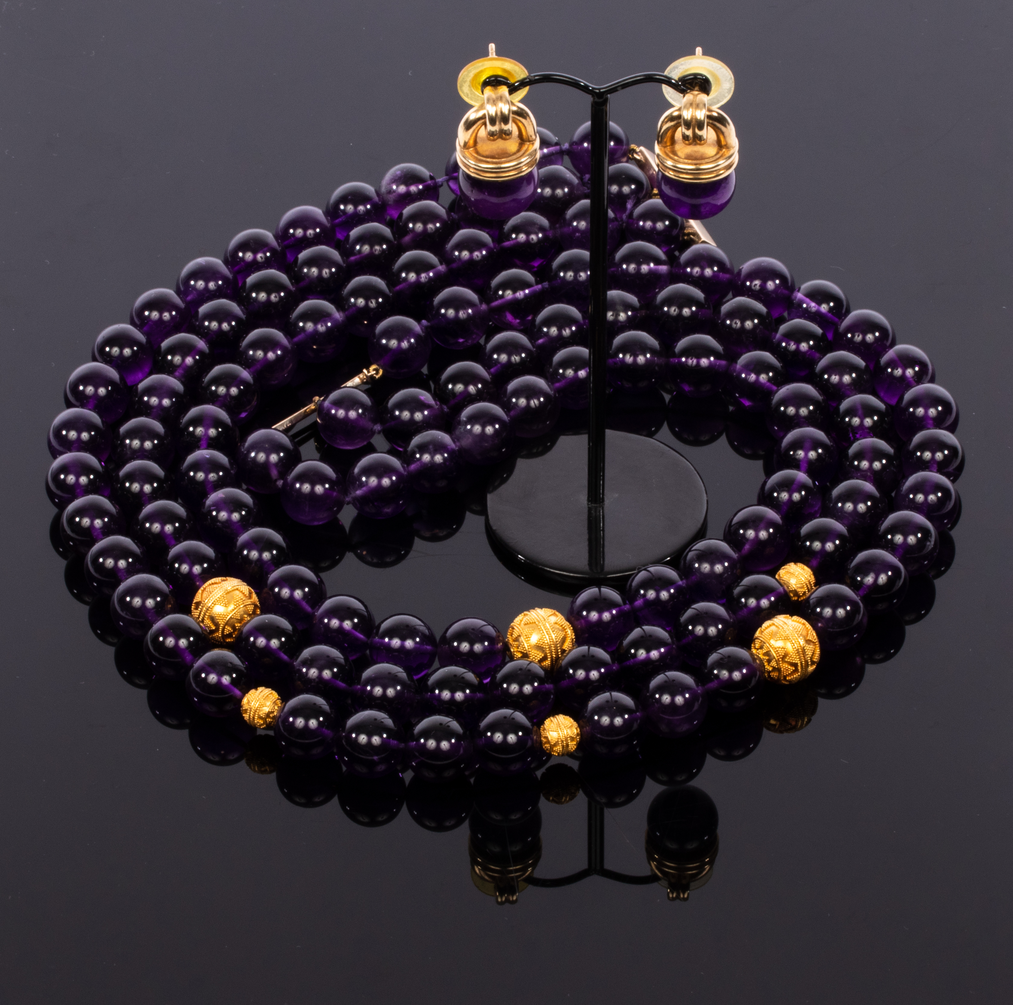 Kiki McDonough, a pair of amethyst cabochon earrings, set in yellow gold, signed, - Image 3 of 6