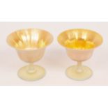 Tiffany, two Favrile footed bowls, with lustre finish, initialled L.C.