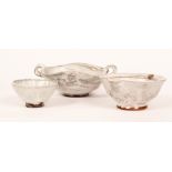 Pat Fuller, three white glazed stoneware bowls, all with impressed marks, the largest with handles,