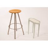A Bulthaup bar stool with circular top on a chromium quadruple support, 36cm diameter,